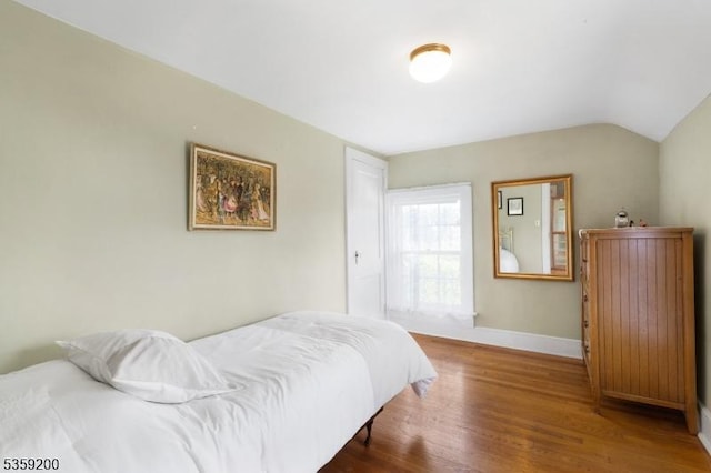 20 Kenvil Ave, Roxbury Twp, NJ 07876 - bedroom with wood finished floors, baseboards, and vaulted ceiling