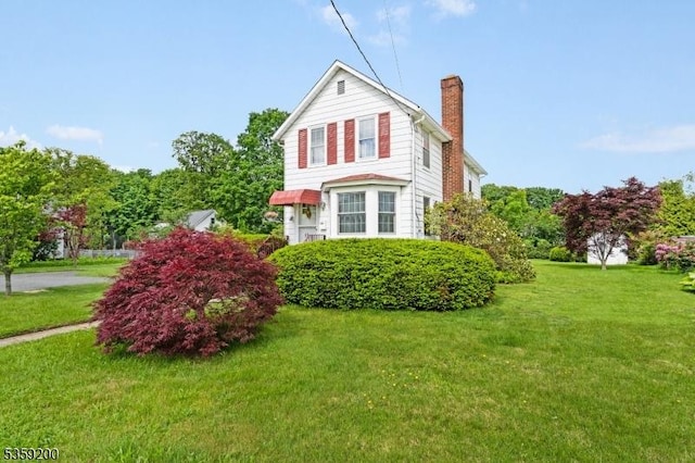 20 Kenvil Ave, Roxbury Twp, NJ 07876 - view of side of property with a chimney and a yard