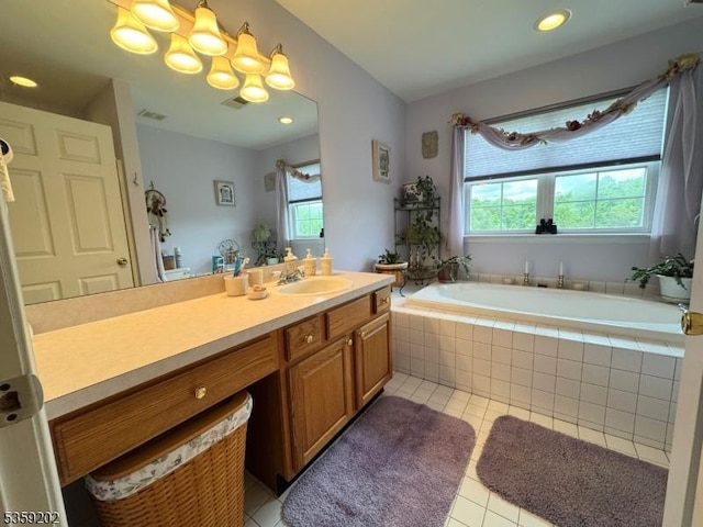 14 Thomas Rd, Lafayette Twp, NJ 07848 - full bath featuring healthy amount of natural light, tile patterned floors, vanity, a bath, and recessed lighting