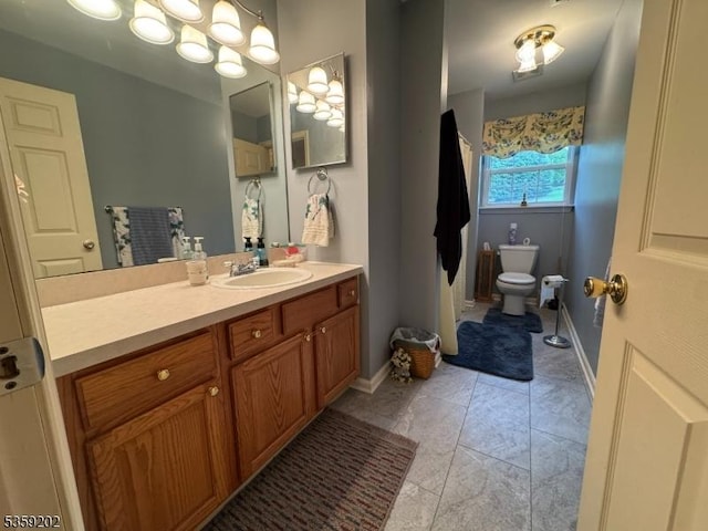 14 Thomas Rd, Lafayette Twp, NJ 07848 - bathroom featuring toilet, vanity, and baseboards