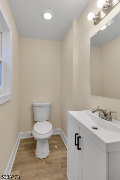 179 Berkeley Ave, Berkeley Heights Twp, NJ 07922 - bathroom featuring vanity, wood finished floors, toilet, and baseboards