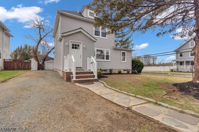 179 Berkeley Ave, Berkeley Heights Twp, NJ 07922 - view of front facade with an outdoor structure and a garage