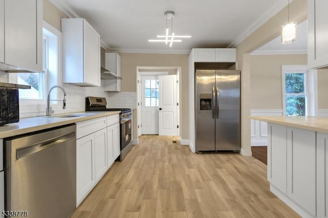 179 Berkeley Ave, Berkeley Heights Twp, NJ 07922 - kitchen featuring stainless steel appliances, a chandelier, a sink, light countertops, and light wood finished floors