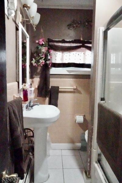 115 Navesink Ave, Highlands Boro, NJ 07732 - bathroom with tile patterned flooring and tile walls