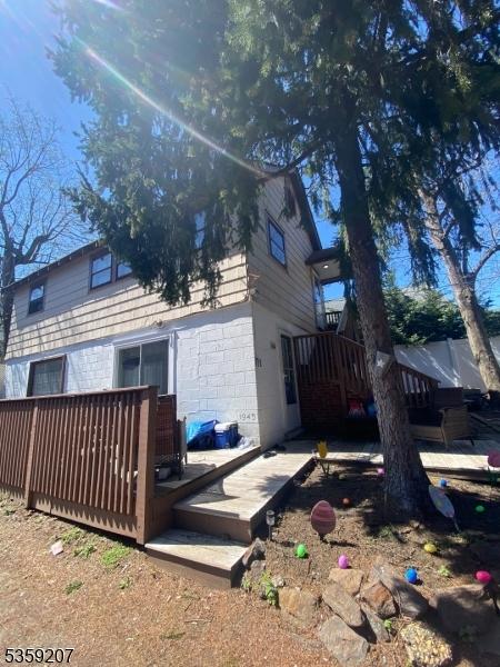 115 Navesink Ave, Highlands Boro, NJ 07732 - back of house with a deck