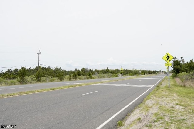 115 Navesink Ave, Highlands Boro, NJ 07732 - view of asphalt road featuring traffic signs