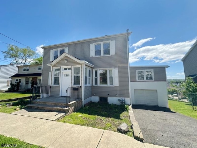 151 Sutton Ave, Totowa Boro, NJ 07512 - view of front of property featuring an attached garage and asphalt driveway