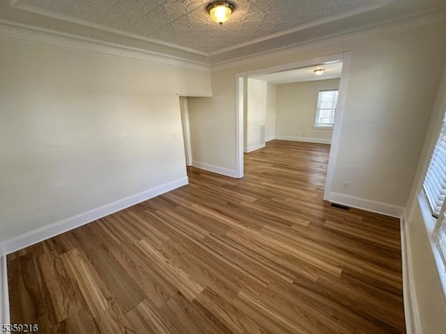 151 Sutton Ave, Totowa Boro, NJ 07512 - unfurnished room with ornamental molding, baseboards, an ornate ceiling, and wood finished floors