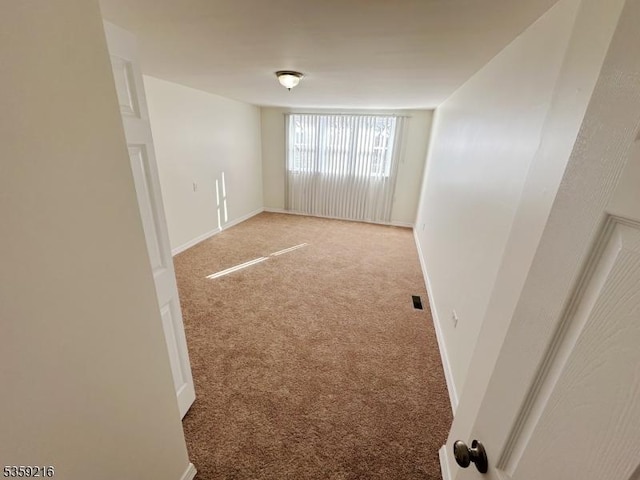 151 Sutton Ave, Totowa Boro, NJ 07512 - spare room with light carpet and baseboards