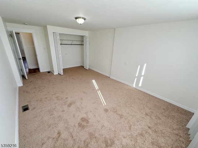 151 Sutton Ave, Totowa Boro, NJ 07512 - unfurnished bedroom with carpet flooring, baseboards, and a closet