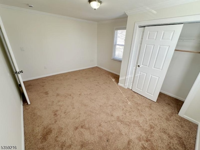 151 Sutton Ave, Totowa Boro, NJ 07512 - unfurnished bedroom featuring crown molding, carpet floors, baseboards, and a closet