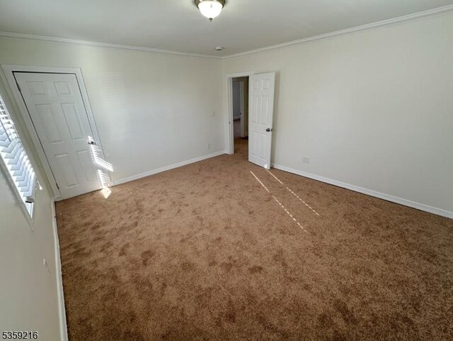 151 Sutton Ave, Totowa Boro, NJ 07512 - spare room featuring carpet flooring, crown molding, and baseboards