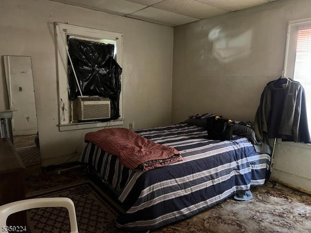 285 N Center St, City Of Orange Twp, NJ 07050 - bedroom with cooling unit and a drop ceiling