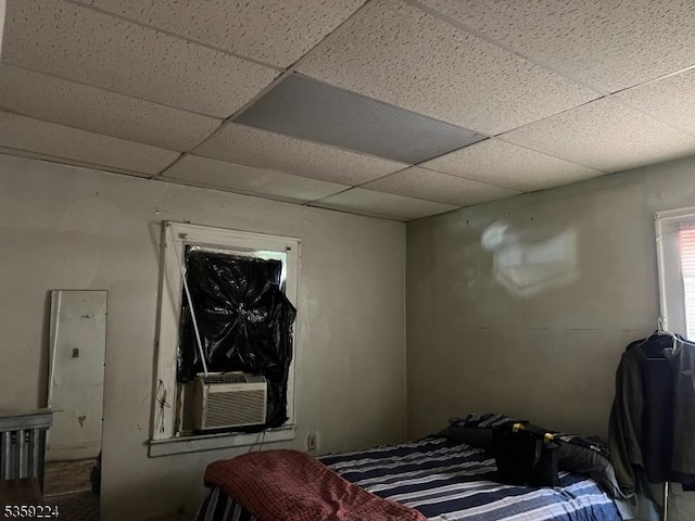 285 N Center St, City Of Orange Twp, NJ 07050 - bedroom with cooling unit and a drop ceiling