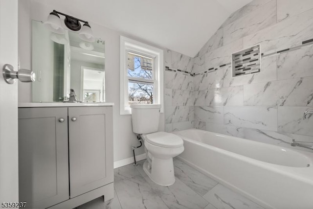 1071 Rose St, Plainfield City, NJ 07060 - full bathroom with toilet, vanity, vaulted ceiling, washtub / shower combination, and marble look tiles