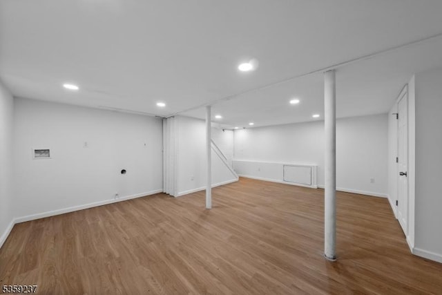 1071 Rose St, Plainfield City, NJ 07060 - finished below grade area with wood finished floors, baseboards, and recessed lighting