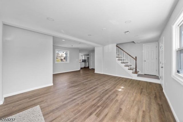1071 Rose St, Plainfield City, NJ 07060 - unfurnished living room featuring stairs, wood finished floors, and baseboards