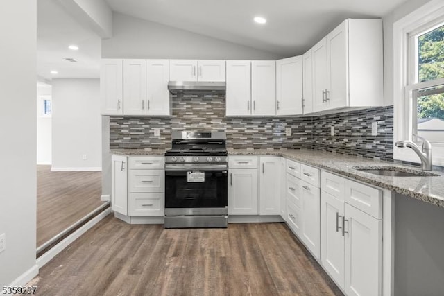 1071 Rose St, Plainfield City, NJ 07060 - kitchen with stainless steel gas range oven, wood finished floors, under cabinet range hood, vaulted ceiling, and white cabinets