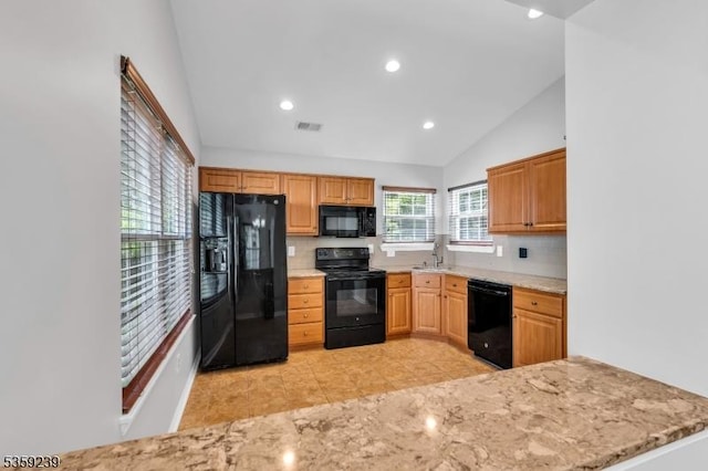 376 Finch Ln, Bedminster Twp, NJ 07921 - kitchen featuring black appliances, decorative backsplash, a sink, vaulted ceiling, and recessed lighting