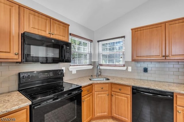 376 Finch Ln, Bedminster Twp, NJ 07921 - kitchen featuring black appliances, a sink, vaulted ceiling, light stone countertops, and backsplash