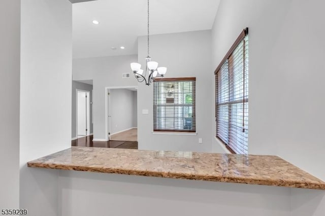 376 Finch Ln, Bedminster Twp, NJ 07921 - kitchen featuring a chandelier, hanging light fixtures, recessed lighting, and light stone counters