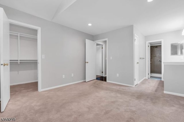 376 Finch Ln, Bedminster Twp, NJ 07921 - unfurnished bedroom with carpet flooring, a walk in closet, baseboards, recessed lighting, and a closet