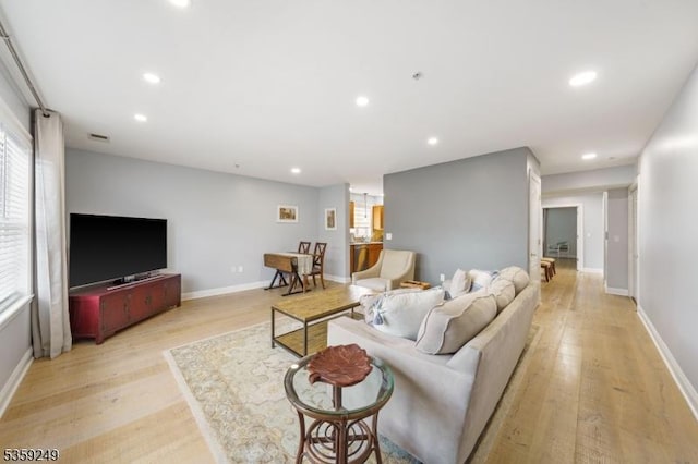 29 E Price St Unit 2, Linden City, NJ 07036 - living room featuring light wood-style floors, healthy amount of natural light, recessed lighting, and baseboards