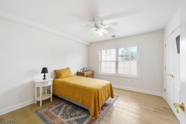 29 E Price St Unit 2, Linden City, NJ 07036 - bedroom with wood finished floors, baseboards, and ceiling fan