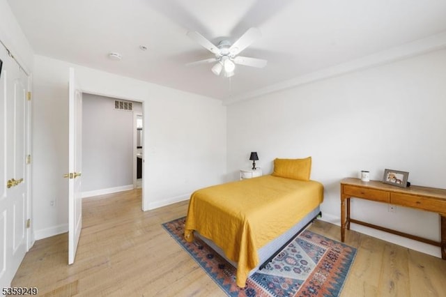 29 E Price St Unit 2, Linden City, NJ 07036 - bedroom with light wood-style flooring, baseboards, and a ceiling fan
