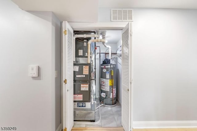 29 E Price St Unit 2, Linden City, NJ 07036 - utility room featuring gas water heater