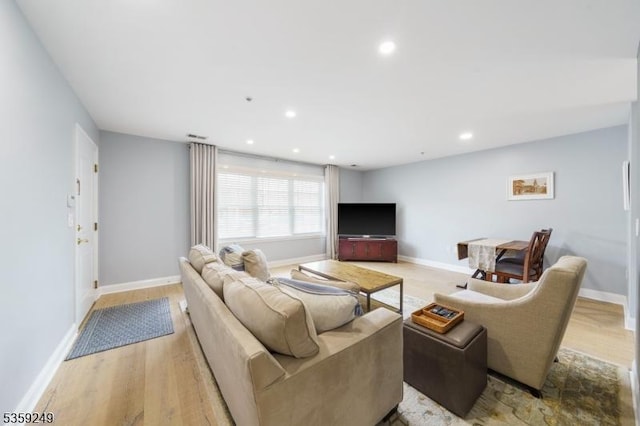 29 E Price St Unit 2, Linden City, NJ 07036 - living room with light wood-style flooring, baseboards, and recessed lighting