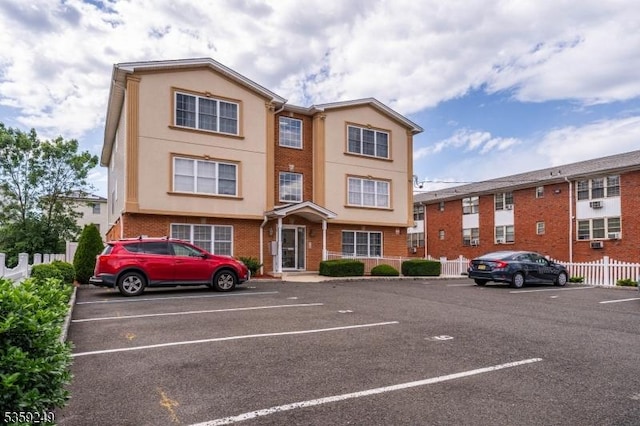 29 E Price St Unit 2, Linden City, NJ 07036 - view of front of house with uncovered parking, brick siding, and stucco siding