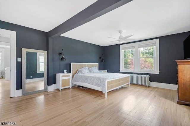 114 Hoagland Ave, Rockaway Boro, NJ 07866 - bedroom with radiator, light wood finished floors, multiple windows, and baseboards
