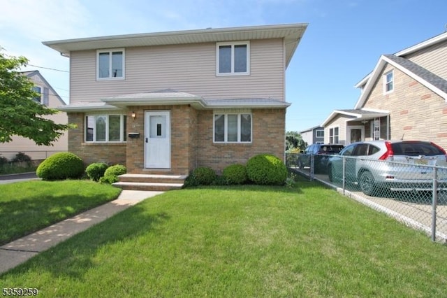 15 Garwood Ct N, Garfield City, NJ 07026 - traditional home featuring entry steps and brick siding