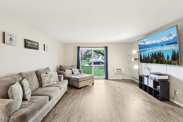798 Eves Dr Unit 3G, Hillsborough Twp, NJ 08844 - living room featuring wood finished floors, a wall mounted air conditioner, and baseboards