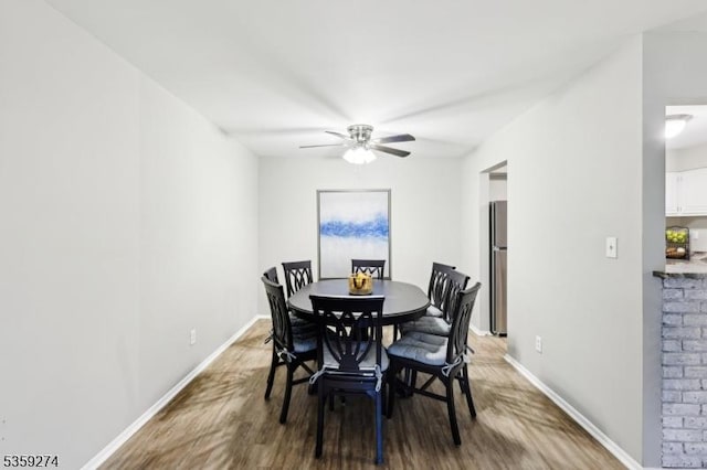 798 Eves Dr Unit 3G, Hillsborough Twp, NJ 08844 - dining area featuring wood finished floors, ceiling fan, and baseboards