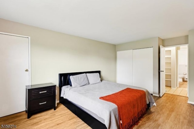 798 Eves Dr Unit 3G, Hillsborough Twp, NJ 08844 - bedroom with light wood-style flooring and a closet