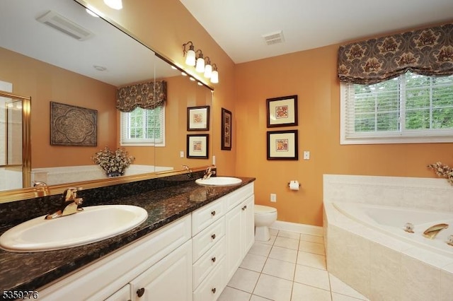 37 Hancock Pl, Franklin Twp, NJ 08873 - full bath with a garden tub, double vanity, tile patterned floors, baseboards, and toilet