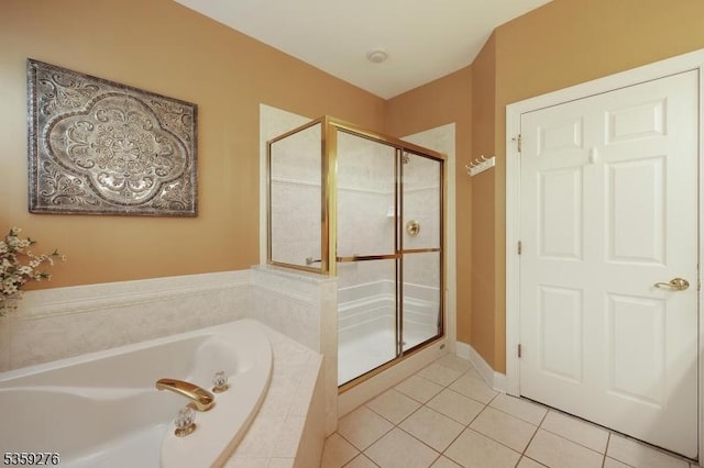 37 Hancock Pl, Franklin Twp, NJ 08873 - bathroom with a shower stall, a bath, and tile patterned floors