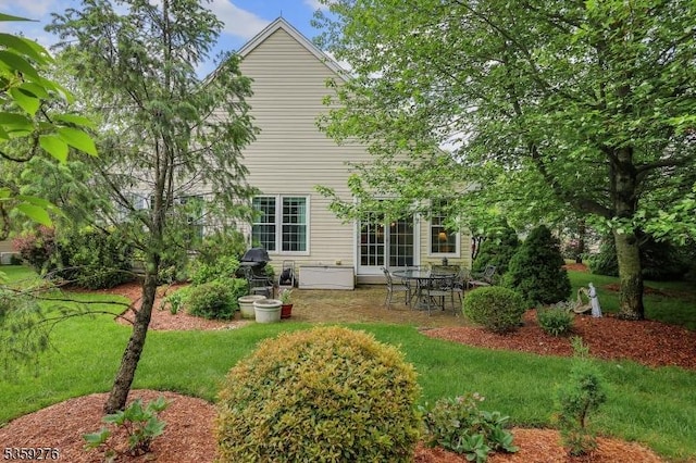 37 Hancock Pl, Franklin Twp, NJ 08873 - back of house featuring a lawn and a patio
