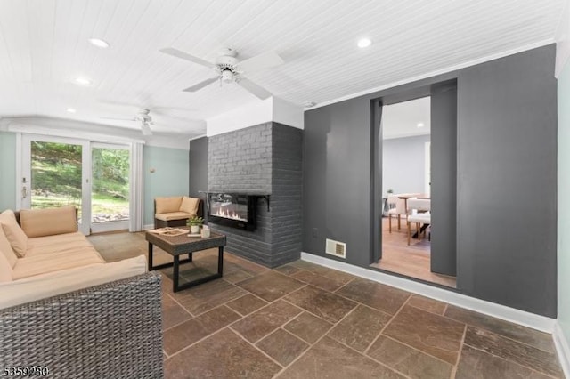 359 Dogwood Way, Mountainside Boro, NJ 07092 - living area featuring baseboards, recessed lighting, a ceiling fan, a brick fireplace, and stone tile flooring