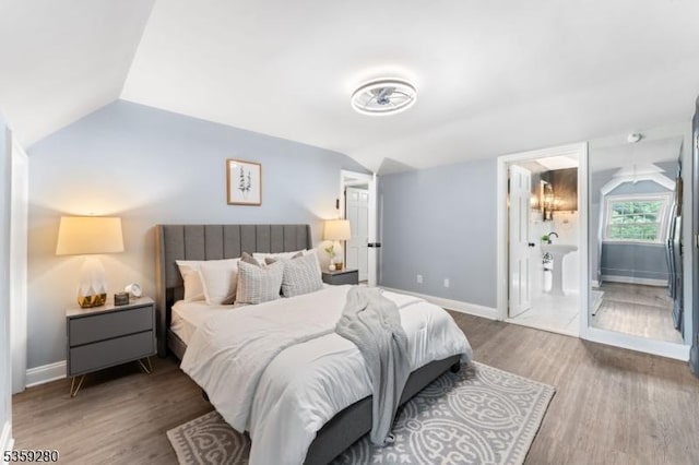 359 Dogwood Way, Mountainside Boro, NJ 07092 - bedroom featuring lofted ceiling, wood finished floors, and baseboards
