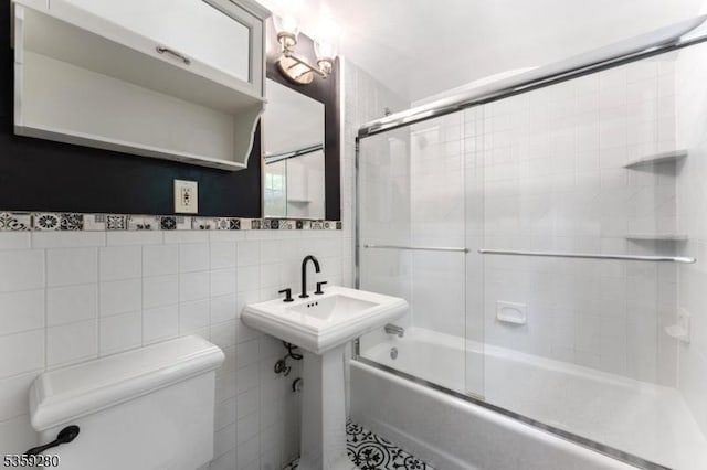359 Dogwood Way, Mountainside Boro, NJ 07092 - bathroom with tile walls, toilet, and shower / bath combination with glass door