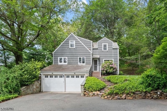 359 Dogwood Way, Mountainside Boro, NJ 07092 - traditional-style home with an attached garage and driveway