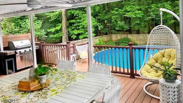7 Park Dr, Kenilworth Boro, NJ 07033 - deck featuring a fenced backyard, ceiling fan, and a grill