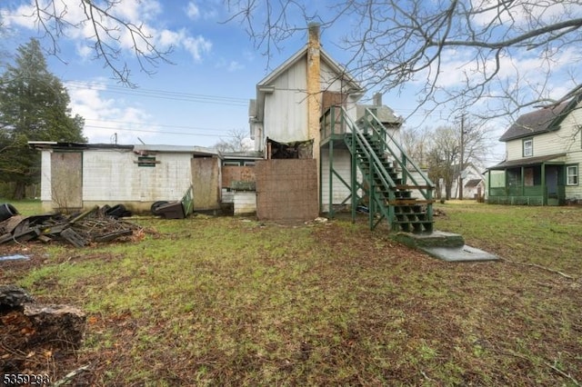 613 S New York Rd, Galloway Twp, NJ 08205 - view of green lawn featuring stairway and an outbuilding