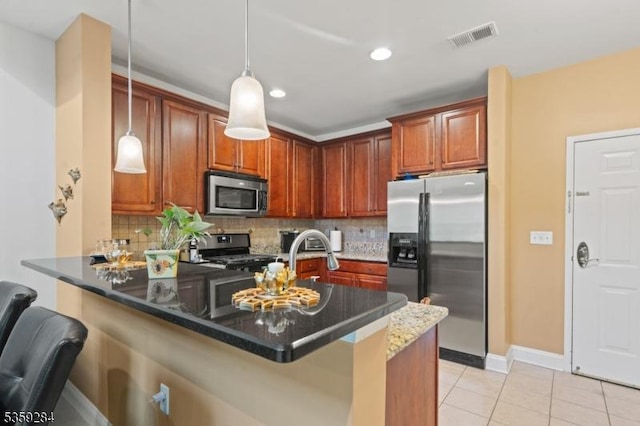6406 Brookhaven Ct, Riverdale Boro, NJ 07457 - kitchen featuring stainless steel appliances, a peninsula, tasteful backsplash, light tile patterned floors, and recessed lighting