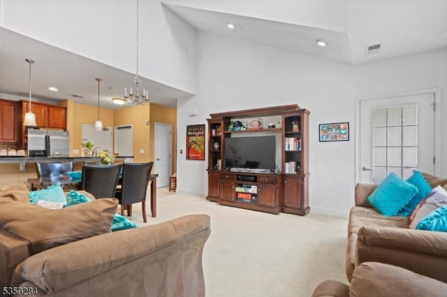 6406 Brookhaven Ct, Riverdale Boro, NJ 07457 - living room with light carpet, baseboards, a chandelier, high vaulted ceiling, and recessed lighting
