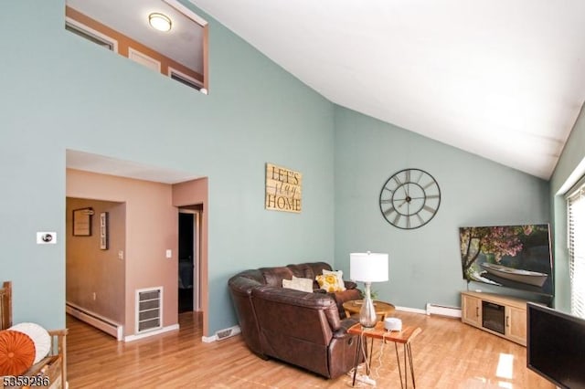107 Heller Hill Rd, Blairstown Twp, NJ 07825 - living area with a baseboard radiator, high vaulted ceiling, light wood-style flooring, and baseboards