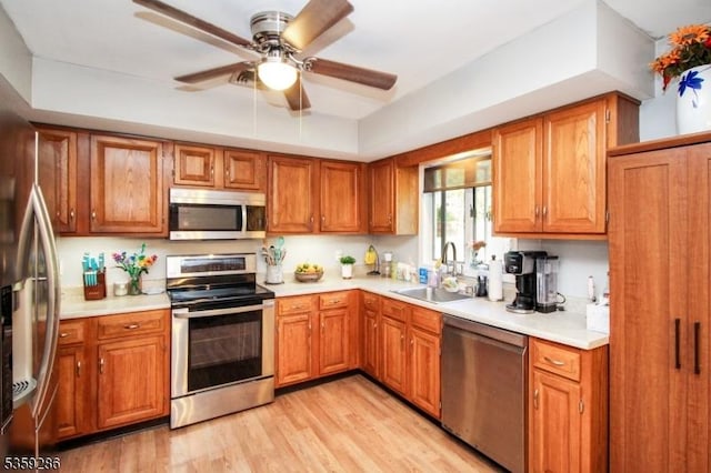 107 Heller Hill Rd, Blairstown Twp, NJ 07825 - kitchen with stainless steel appliances, a sink, light countertops, and brown cabinetry